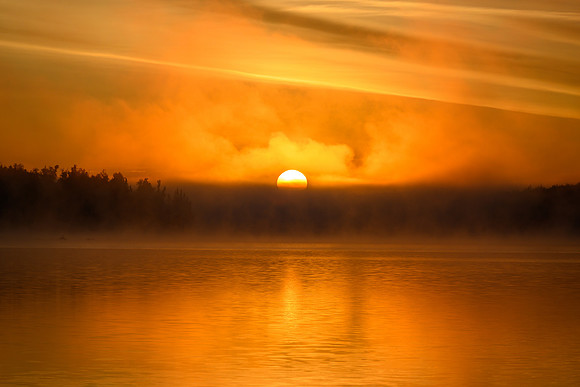 Sunrise from the best camp of the trip on Robertson Lake.