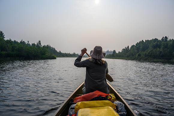 Paddling the Drinking River up Irving Lake.
