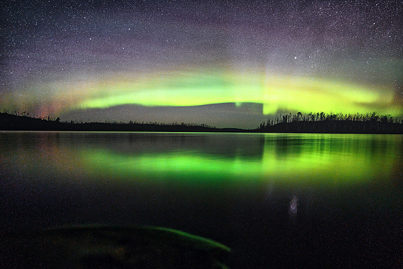 Aurora borealis (northern lights) over Colin Lake.