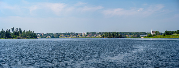A last glance back at Stanley Mission and its church across the Churchill River.