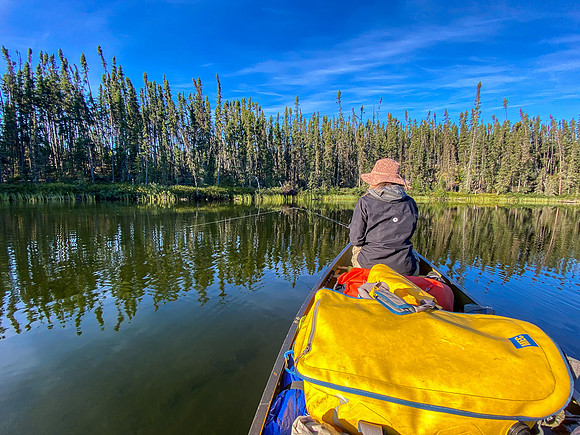 Paddling a calm Minuhik Lake.