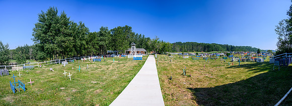 Touring the cemetery at the Stanley Mission church grounds.