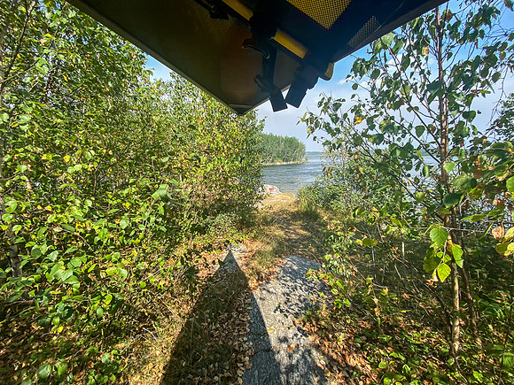 Carrying the canoe past Stanley Rapids.