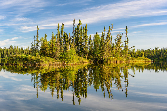 Paddling a calm Minuhik Lake.