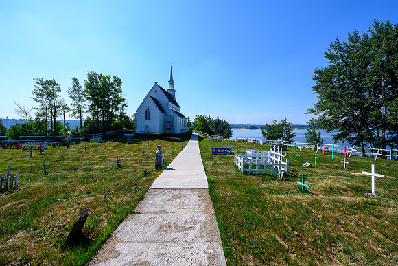 Touring the cemetery at the Stanley Mission church grounds.