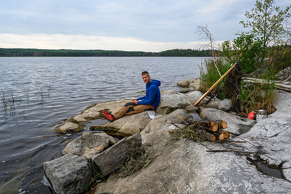 Vern journals at camp on Boland Lake.