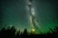 The Milky Way and Jupiter (L) over our camp on the north end of Sandomirsky Island on Colin Lake.