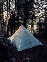 Sunset on my tent, tucked in the forest.