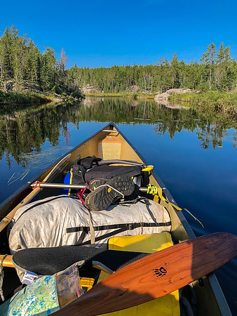 Paddling the unnamed lake between Page and Bell.