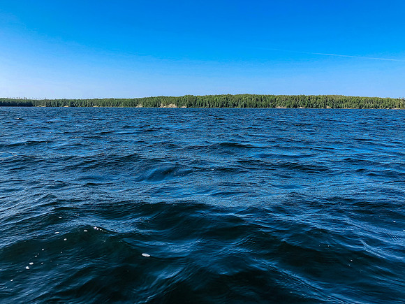 Paddling a windy Crystal Lake.