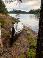 Back at Onnie Lake, canoe is stored and ready for storms.