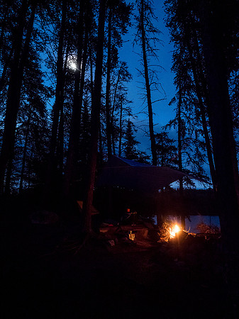 The moon rises over my fire on Sunday night on Onnie Lake.