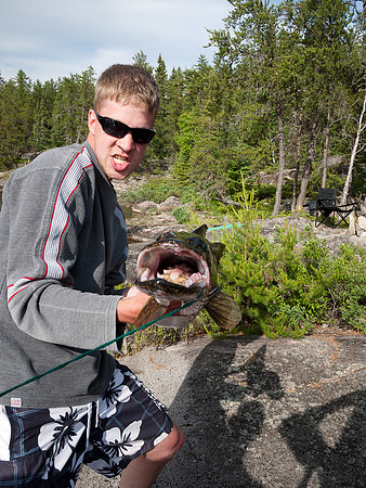 Rod and his catch do a camera pose together.