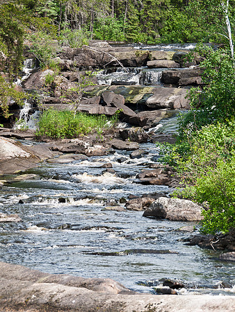 The waterfall that supplied our Walleye factory provided background noise for the camp.