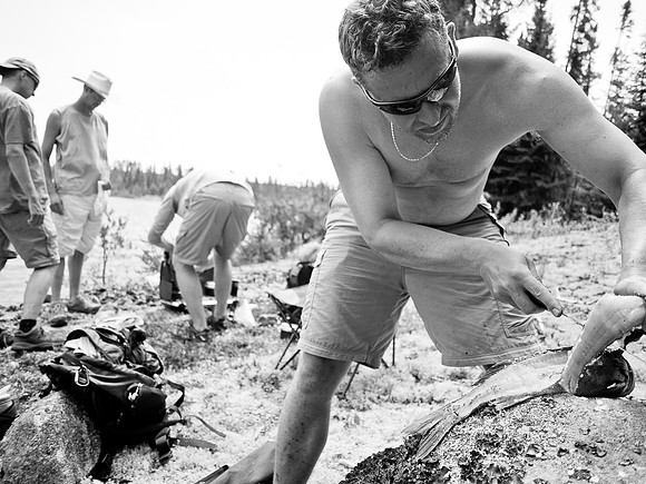Mike's cooking up the fillets as fast has Harry can cut them.