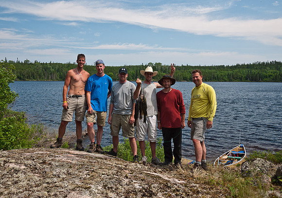 The gang with lunch. It took about 5 casts to catch these. We threw the other 150 back.