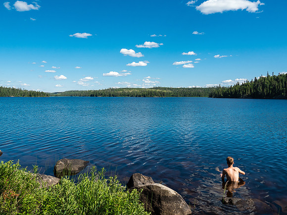 Nothing feels better than a dip in the lake after a hot day of portaging and paddling.