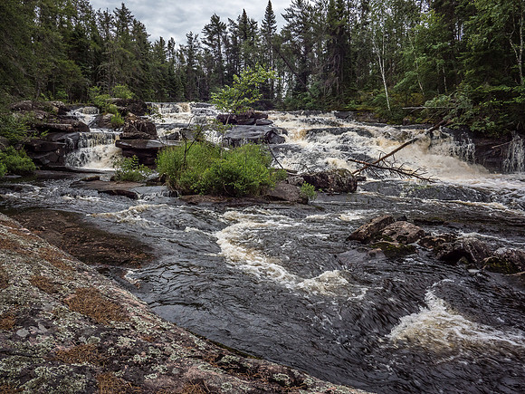 The falls across from camp that provide the Walleye Factory (our camp is visible in the distance).