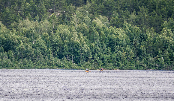 Here they come! Bill, Harold, Dylan and Jon paddle into Upper Glenn from the Optic portages to the south of our camp.