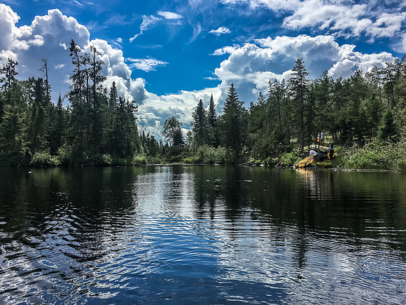 Still sunny in this direction as the other members of the group finish up the 100m portage into Telescope - we never looked back from here to camp! ;)