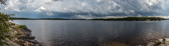 The dead-calm lake (Haven) from our camp showing the stormy skies that are all around.