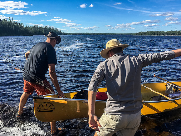 Launching into waves after coming back from Robertson Lake and looking towards our camp about 1km from here in Upper Hatchet.