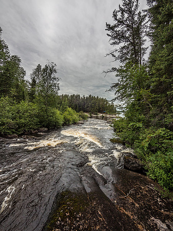 The falls across from camp that provide the Walleye Factory (our camp is visible in the distance).