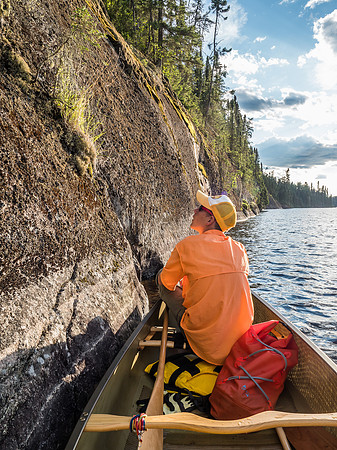Exploring some cliffs near camp after supper.