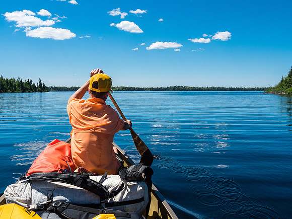 Gorgeous Telescope Lake welcomes us with calm water and a clear, blue sky.