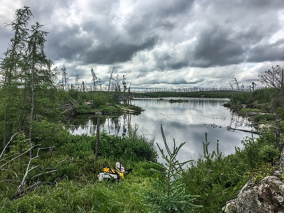 Looking back at our gear and Jigsaw Lake from the end of the 575m portage from Gulch to Jigsaw.