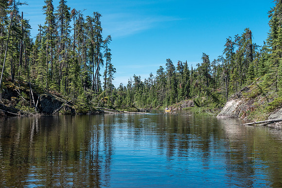 The 2nd 20 meter "portage" was actually a careful paddle over submerged rocks - a benefit to the water being a bit high for July.