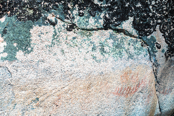 This was a canoe with people in it - they were faded and worn.