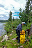 Bill readies his pack at the Leano Lake put-in at the end of a 350m portage from the parking lot.