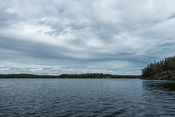 The other boat approaches us - often we get separated by up to 1km but it's no big deal as long as the lead canoe waits at portages for the others.