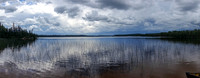 Looking at the impending storm from the end of the 1000m portage. Note how quiet the water is? That didn't last long!