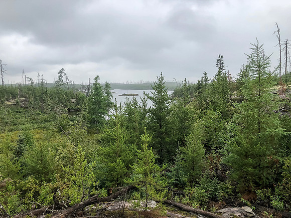 Dismal weather blows through as we execute the 575m portage from Gulch to Jigsaw Lake.