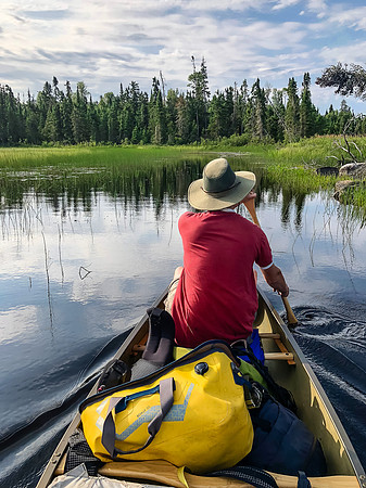 Paddling the Rostoul River between Optic and Telescope Lake.