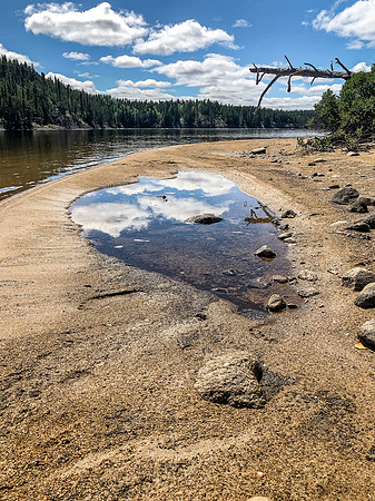 A sandy beach on Mexican Hat Lake.