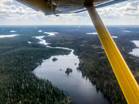 We'll be canoeing down this narrow waterway within a few hours. Haven at left and Adventure at right. As you can see, this area is already burned from previous fires.