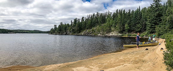 Just as we beached the canoes on the sandy beach, the sun started poking through the clouds until it was almost getting warm outside.