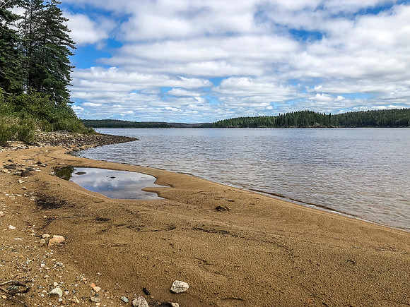 A sandy beach on Mexican Hat Lake.