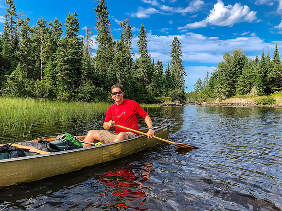 Harold in his favorite place - the back of a canoe!