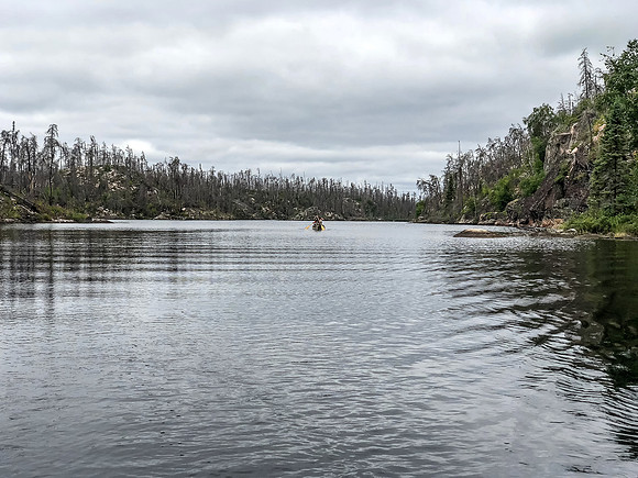 Paddling the narrow and scenic Amber Lake.