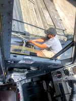 Strapping the canoe to the float.