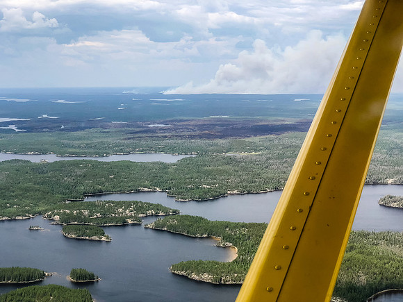 Looking over Domain Lake towards the wildfire that blocked our original route which was right through the burnt (and still smoldering) area at center.