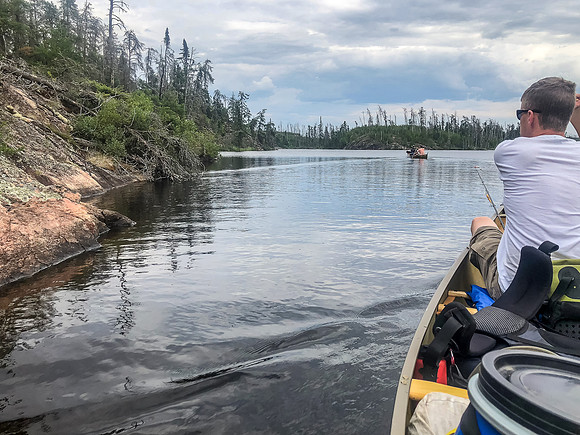 Paddling on the narrow waterway between Adventure Lake and Haven Lake.