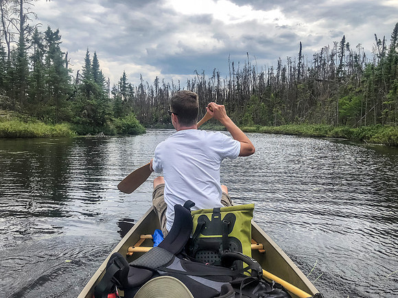 Paddling on the narrow waterway between Adventure Lake and Haven Lake.