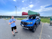 All the primary colors. Bill and Harold's new canoes on Bill's truck.