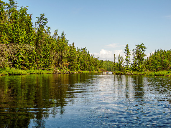 The sun comes back as we paddle a scenic channel towards the last few portages into East Lunch Lake.