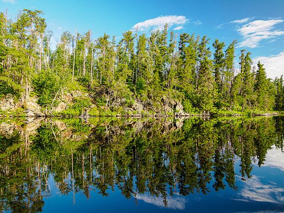 Paddling north out of Bunny Lake on glass.